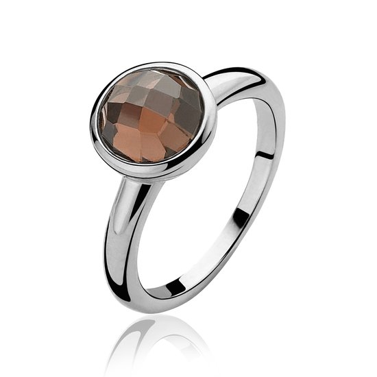 Bague en argent avec pierre brune facettée.