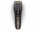 Donkergrijze Philips haartrimmer met digitaal display en turboknop.