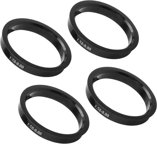 Vier zwarte velgcenterringen, 66.6 mm naar 57.1 mm, op een witte achtergrond.
