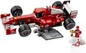 Voiture de course LEGO Ferrari F2004 rouge avec des ailerons blancs, des pneus 'Bridgestone Potenza', sur un présentoir avec une figurine.