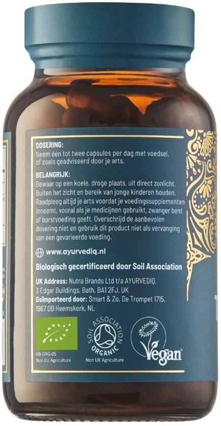 Bruine fles met blauw etiket met gouden ornamenten en productinformatie in het Nederlands, inclusief dosering en website.