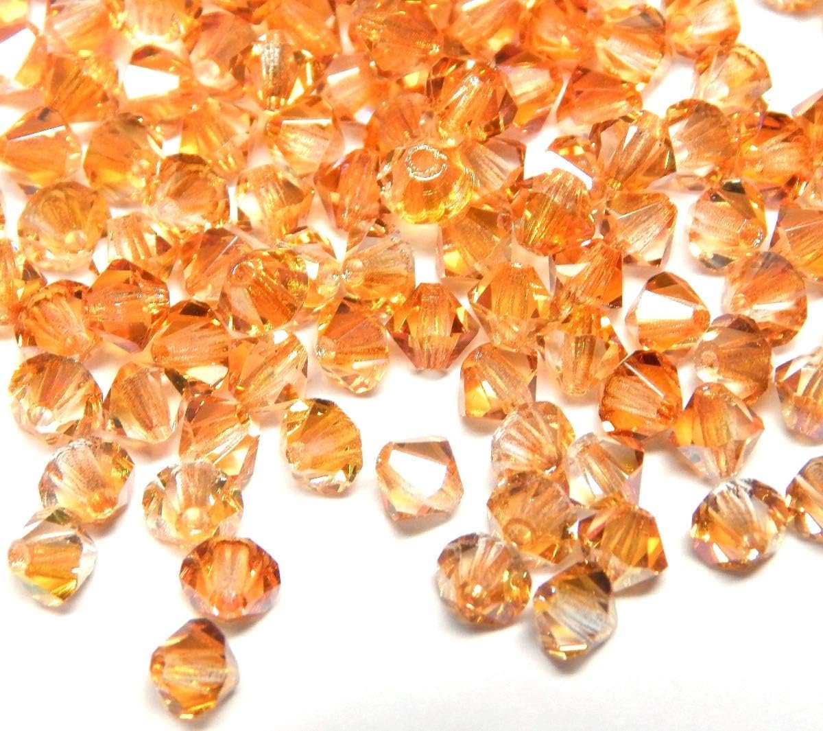 Kralen 4mm dubbele kegel Tsjechische kralen glasgeslepen kralen glaskralen, Bicone kralen 40 Stk (Crystal Copper AB)