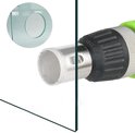 Diamantschijf op een boor, die een rond gat boort in een glazen plaat.