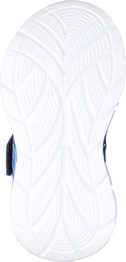 Onderkant van een blauwe Skechers gymschoen met witte zool en limegroene accenten.
