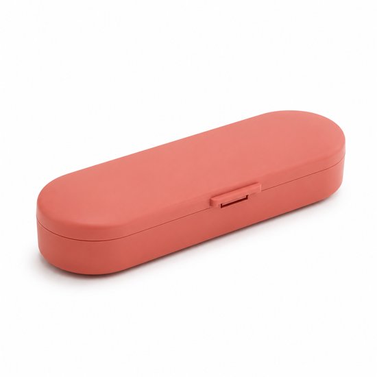 Koraalrode pillendoos met een afgeronde, ovale vorm en een kliksluiting aan de zijkant.
