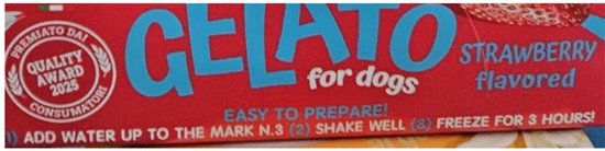 Verpakking met 'GELATO for dogs' en 'STRAWBERRY flavored'. Bevat ook instructies: 'EASY TO PREPARE! ADD WATER UP TO THE MARK N.3 (2) SHAKE WELL (3) FREEZE FOR 3 HOURS!'