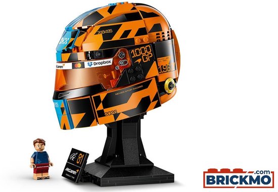Blauw-oranje LEGO-helm met "OSCAR"-opschrift en oranje vizier, op een standaard met McLaren-logo.