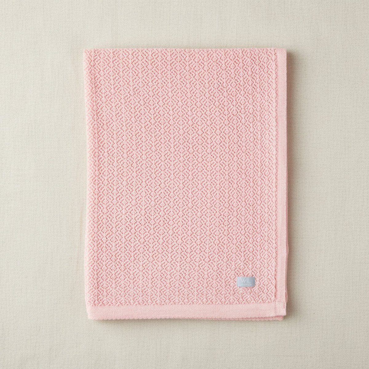 Deken van merino wol met pointelle patroon - roze