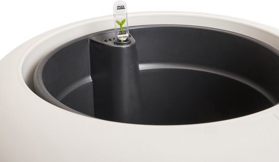 Bovenaanzicht van de binnenkant van een witte pot met watermeter.
