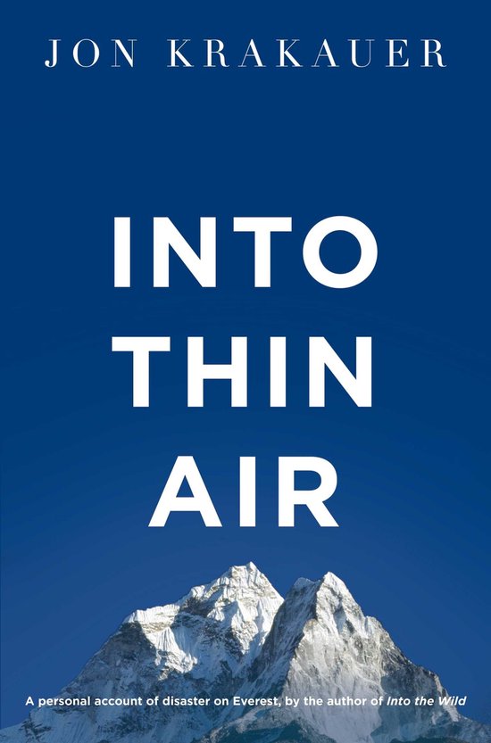 Livre 'Into Thin Air' de Jon Krakauer. Texte blanc sur fond bleu avec le sommet d'une montagne enneigée.