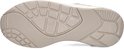 Onderkant van een beige sneaker met een rubberen zool en HUB-logo.