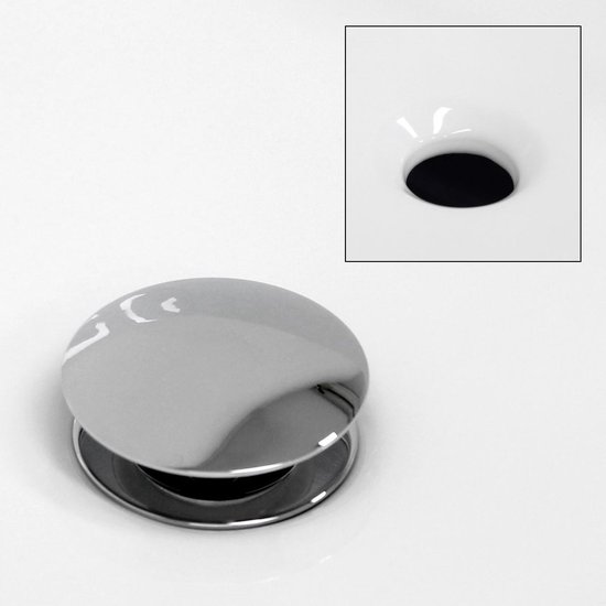 Bouchon de vidange chromé dans un lavabo rond en céramique blanche.
