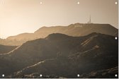 Zonsondergang achter de Hollywood Hills bij Los Angeles - Foto op Tuinposter - 150 x 100 cm