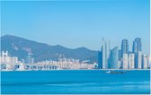 Gebergte achter de panoramische skyline van Busan - Foto op Forex - 45 x 30 cm