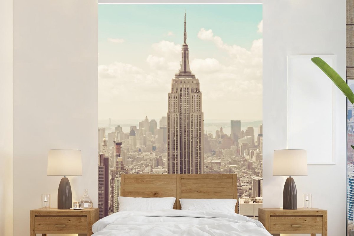 Behang - Fotobehang Uitzicht op het Empire State Building met een ouderwets thema - Breedte 180 cm x hoogte 280 cm