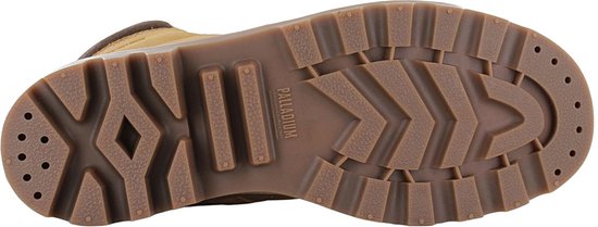 Semelle d'une botte Palladium marron au profil épais avec logo Palladium.