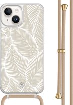 Casimoda® - Coque iPhone 14 avec cordon beige - Feuilles de palmier beige - Cordon amovible - TPU/acrylique