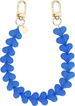 xoxo Wildhearts telefoonkoord - Funky Hearts Charm Cord (denim blue) - Geschikt voor iPhone - Geschikt voor Samsung - Universeel Phone Cord - Telefoonketting - Bedeltje voor telefoon - Telefoonhanger - kralenketting - Ketting met hartjes - Blauw