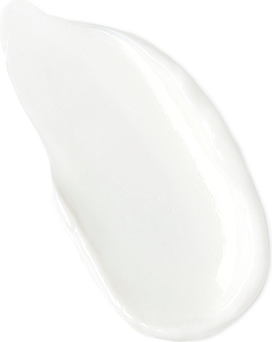 Een veeg witte crème op een witte achtergrond.