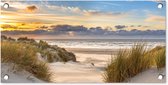 Tuinposter Strand - Duin - Gras - Zonsondergang - Zee - 60x30 cm - Tuindoek - Buitenposter