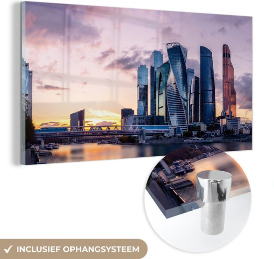 MuchoWow® Glasschilderij 80x40 cm - Schilderij acrylglas - Moskou zakencentrum tijdens een zonsondergang - Foto op glas - Schilderijen