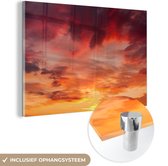 MuchoWow® Glasschilderij 120x80 cm - Schilderij acrylglas - Wolken - Zon - Rood - Foto op glas - Schilderijen