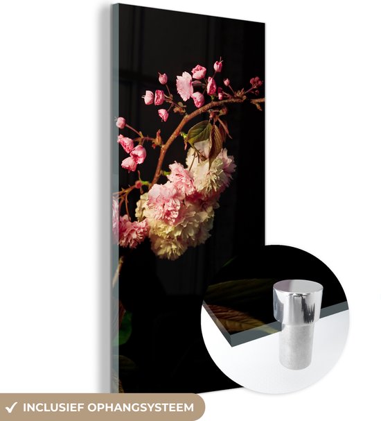 MuchoWow® Glasschilderij 40x80 cm - Schilderij acrylglas - Een kersenbloesem tegen een zwarte achtergrond - Foto op glas - Schilderijen