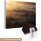 MuchoWow® Glasschilderij 120x80 cm - Schilderij acrylglas - Mist boven Java - Foto op glas - Schilderijen