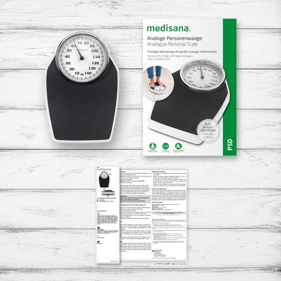 Emballage avec balance personnelle analogique au design rétro, textes en allemand.