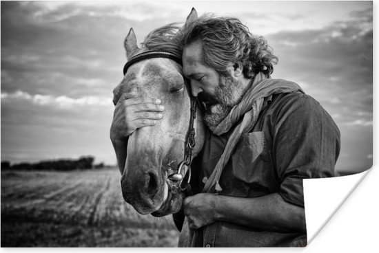 Poster Vriendschap tussen een paard en een man in zwart-wit - 90x60 cm