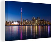 Canvas Schilderij Skyline van Toronto met weerspiegeling in de nacht - 60x40 cm - Wanddecoratie