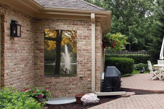 Silhouette d'un vélo devant une fontaine dans le Vondelpark à Amsterdam affiche de jardin 80x120 cm - Toile de jardin / Toile d'extérieur / Peintures d'extérieur (décoration de jardin)