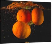 Sinaasappels in water - Foto op Canvas - 100 x 75 cm