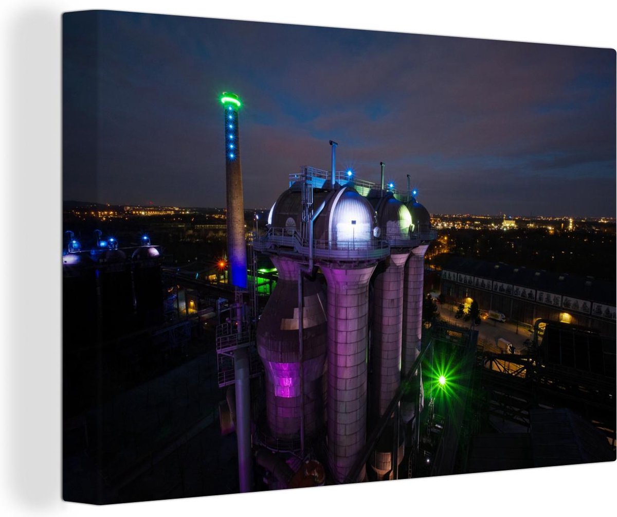 Canvas Schilderij Verlichting in de nacht in Duisburg - 90x60 cm - Wanddecoratie