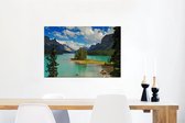 Île sur un lac dans le parc national Jasper au Canada Toile 60x40 cm - Tirage photo sur toile (Décoration murale salon / chambre)