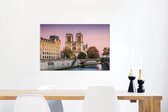 Canvas Schilderij Paarse lucht over de Notre Dame in Parijs - 60x40 cm - Wanddecoratie