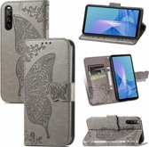 Voor Sony Xperia 10 III Vlinder Liefde Bloemen Reliëf Horizontale Flip Lederen Case met Houder & Kaartsleuven & Portemonnee & Lanyard (Grijs)