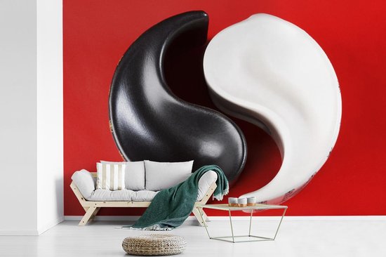 Cendrier Yin et Yang devant un fond d' fotobehang rouge