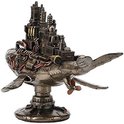 Steampunk walvis met fabrieksgebouwen, bronzen afwerking.