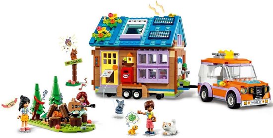 Een LEGO Friends kampeer set met een caravan, speelgoedauto, klein huisje, campfire, poppetjes en dieren.