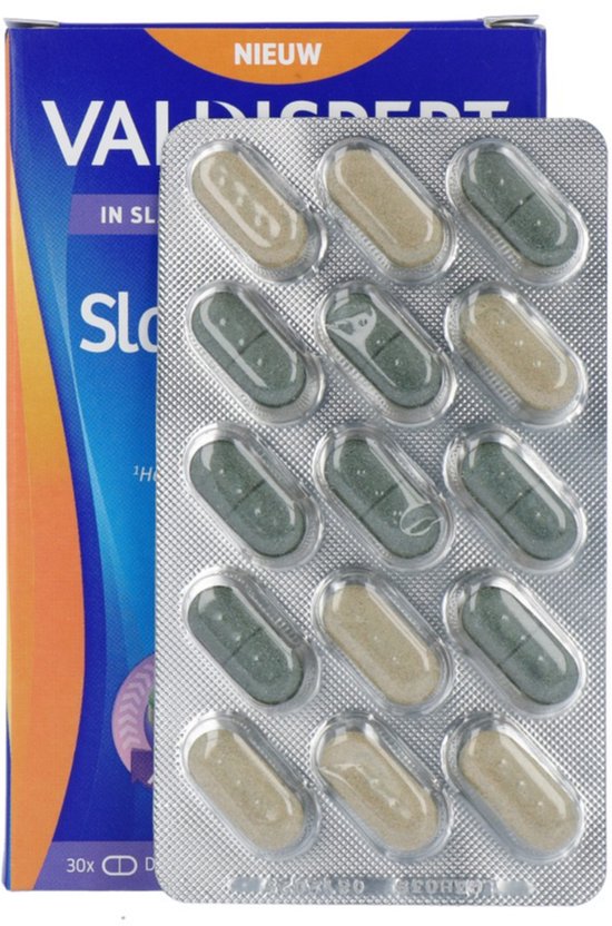 Blister verpakking met 12 dubbellaagse tabletten (groen en beige) naast een Valdispert Slaap & Nacht Advanced verpakking.