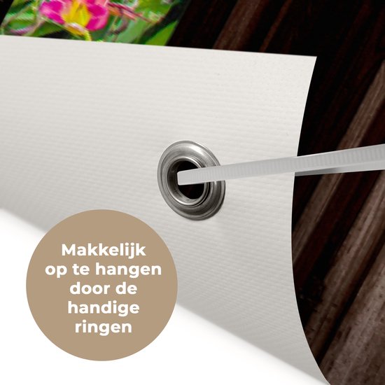 Tuinposter doorkijk bloemen - Donkerbruin raam - Tuindecoratie hortensia - 120x80 cm - Tuinschilderij voor buiten paars - Tuindoek - Wanddecoratie tuin - Schuttingdoek - Balkon decoratie - Muurdecoratie - Buitencanvas tuinversiering