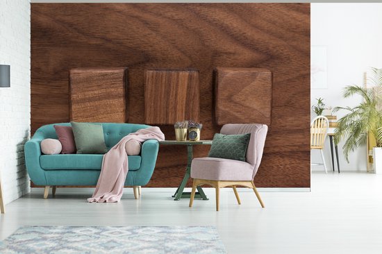 Cubes en bois sur un fond en bois fotobehang