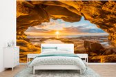 Behang - Fotobehang Grot - Zee - Horizon - Zonsondergang - Breedte 320 cm x hoogte 240 cm