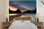 Behang - Fotobehang Zonsondergang Nationaal park Fiordland in Nieuw-Zeeland - Breedte 260 cm x hoogte 260 cm