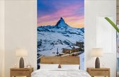 Behang - Fotobehang Schemering bij het Zwitserse Matterhorn bij Gornergrat-bahn - Breedte 120 cm x hoogte 240 cm
