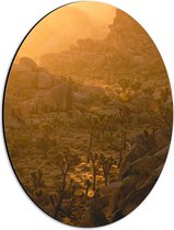 WallClassics - Dibond Ovaal - Oranje Rook boven Berglandschap - 30x40 cm Foto op Ovaal (Met Ophangsysteem)