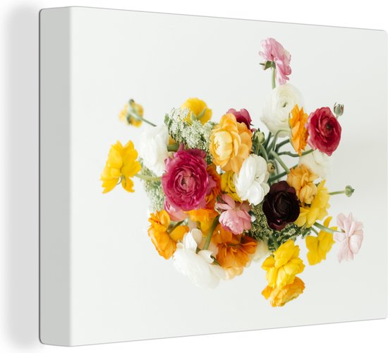 Canvas Schilderij Boeket van kleurrijke boterbloemen op een lichte achtergrond - 40x30 cm - Wanddecoratie