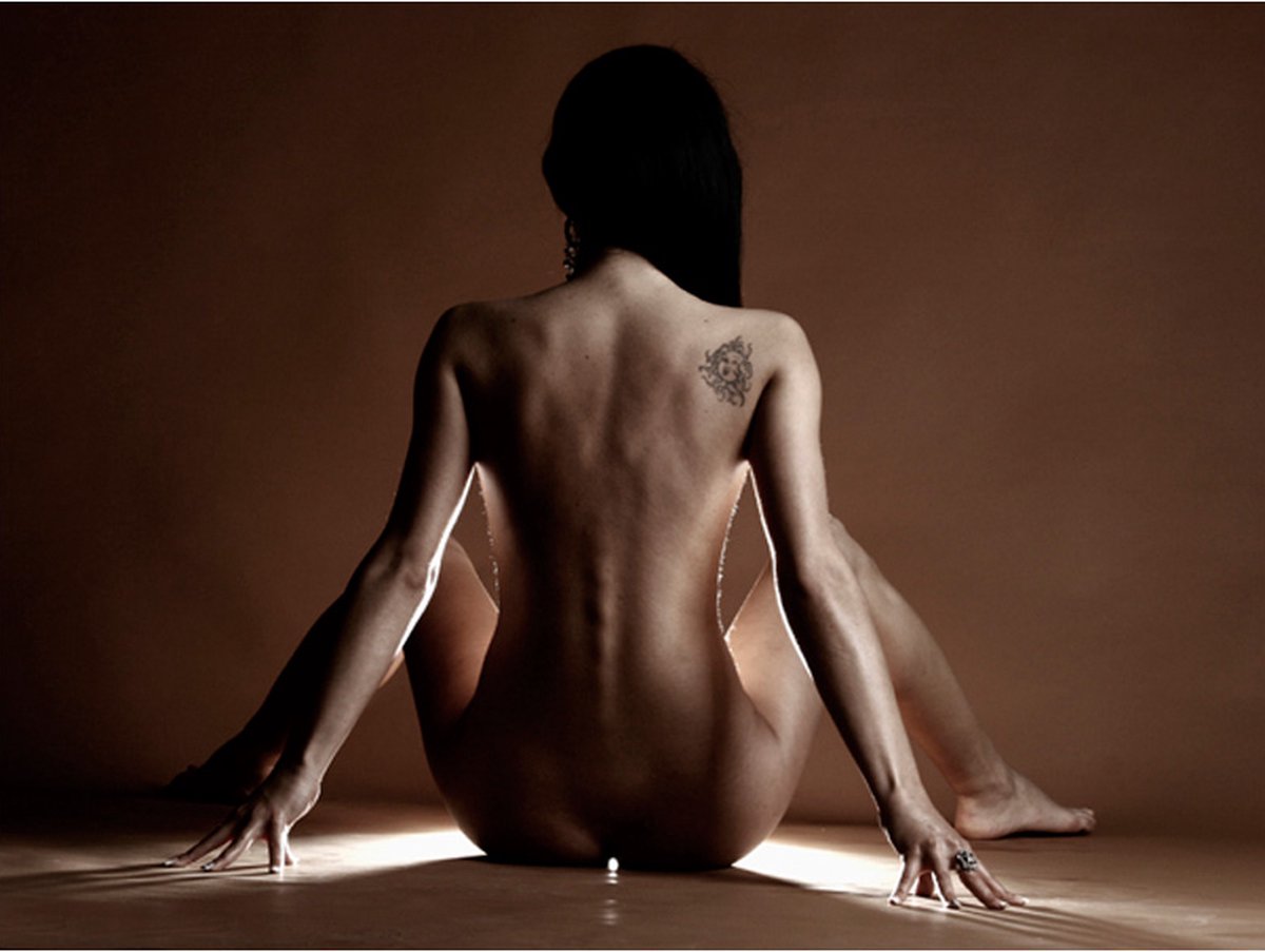 Fotobehang - Vrouw met tattoo.