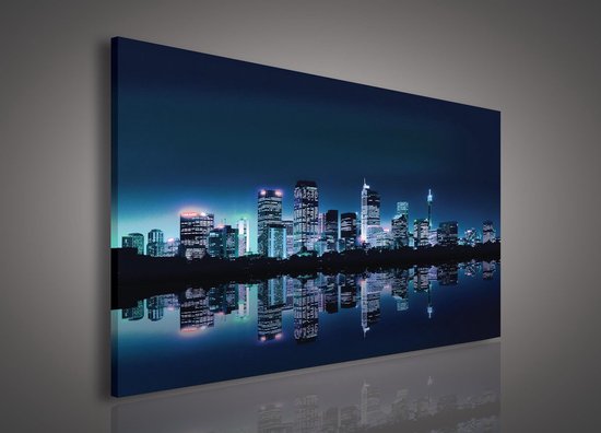 Canvas Schilderij - New York - Stad - Lichten - Skyline - Toren - Blauw - Gebouw - Schilderij Woonkamer - Schilderijen op canvas - Inclusief Frame - 45x145cm (LxB)